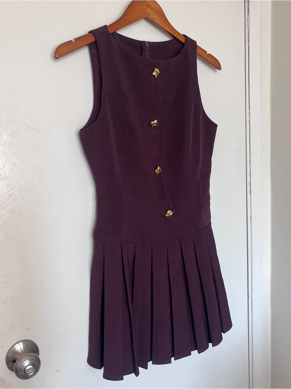 Girls Pleated Sleeveless Dress in Deep Plum with Gold Buttons